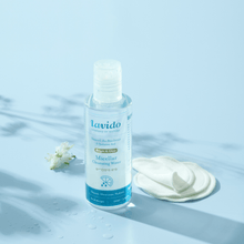 Load image into Gallery viewer, Lavido Micellar Cleansing Water applied to a cotton pad