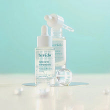Load image into Gallery viewer, Lavido Hyaluronic Acid X3 Hydrating Serum bottles with a glass sphere on light teal