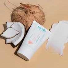 Load image into Gallery viewer, Lavido Musk &amp; Coconut Aromatic Body Lotion tube with a cream swatch and cracked coconut
