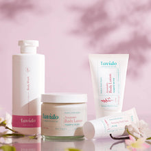 Load image into Gallery viewer, Lavido Patchouli &amp; Vanilla body wash, body lotion and hand cream on a pink background