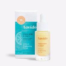 Load image into Gallery viewer, Lavido Vitamin C Brightening Serum dropper bottle next to its turquoise box